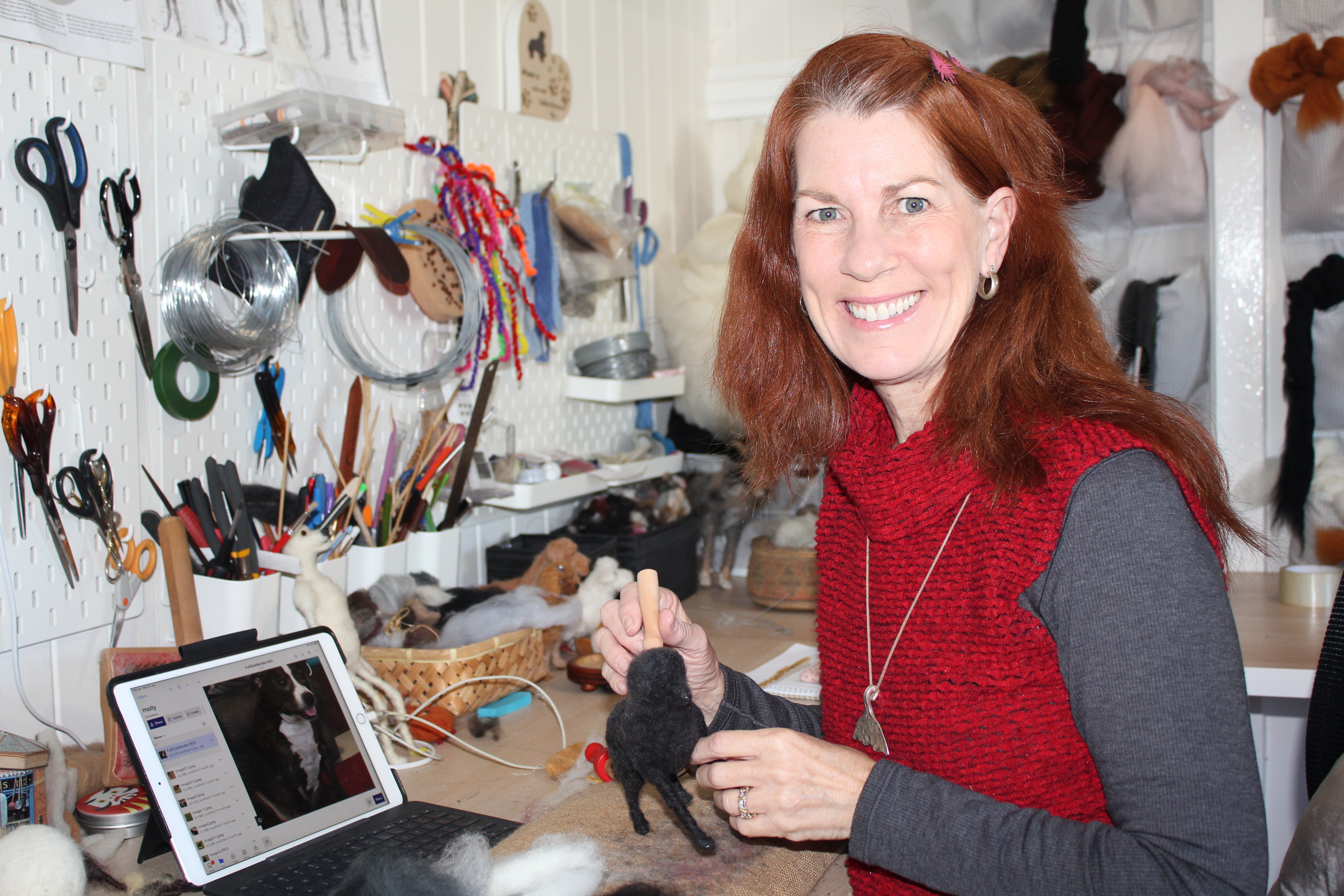 A woman enjoying a felting class as her Mother's Day present