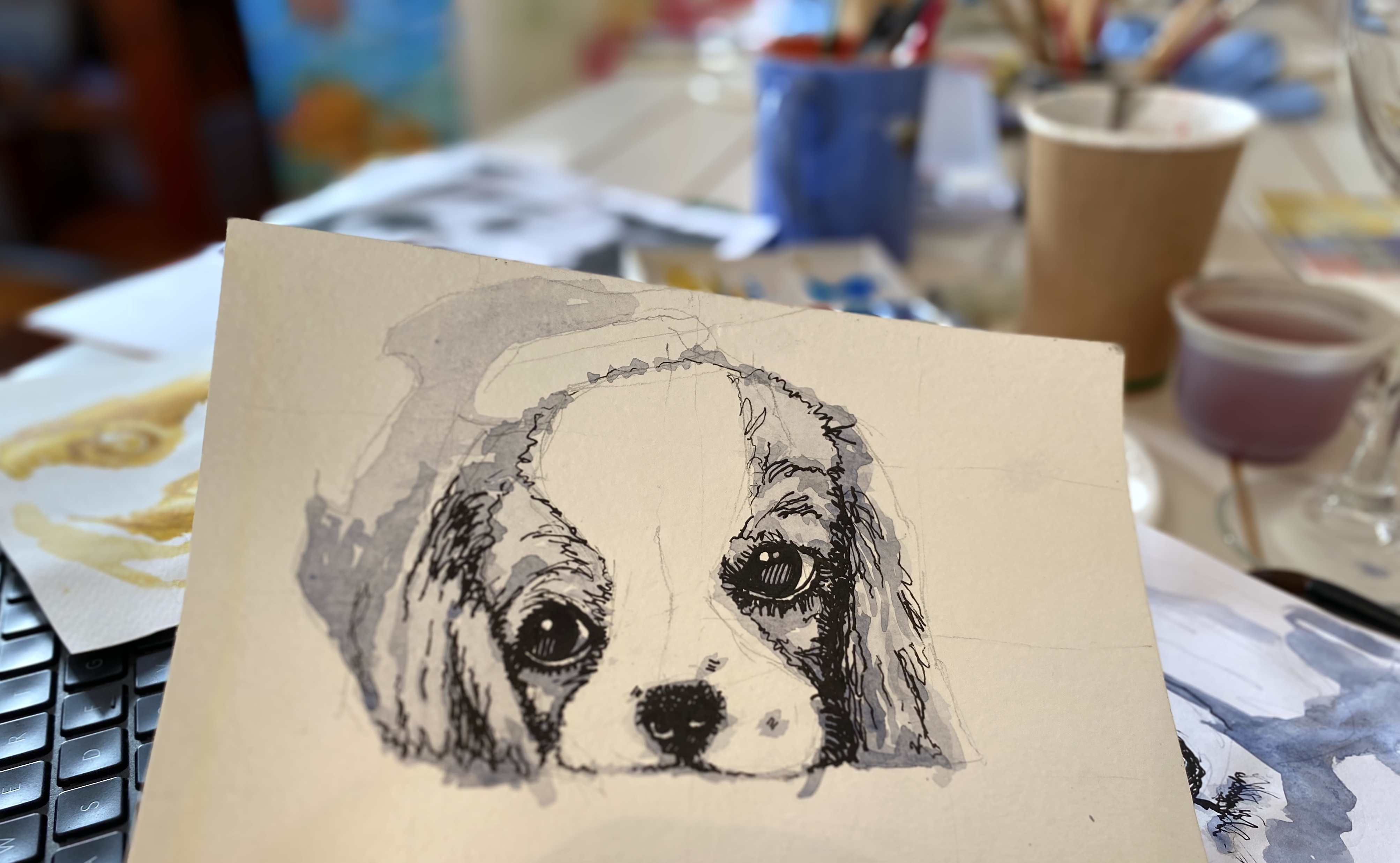 Watercolour and ink portrait of a dog
