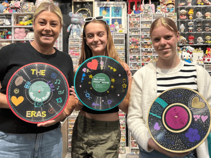 happy customers with their painted vinyl records