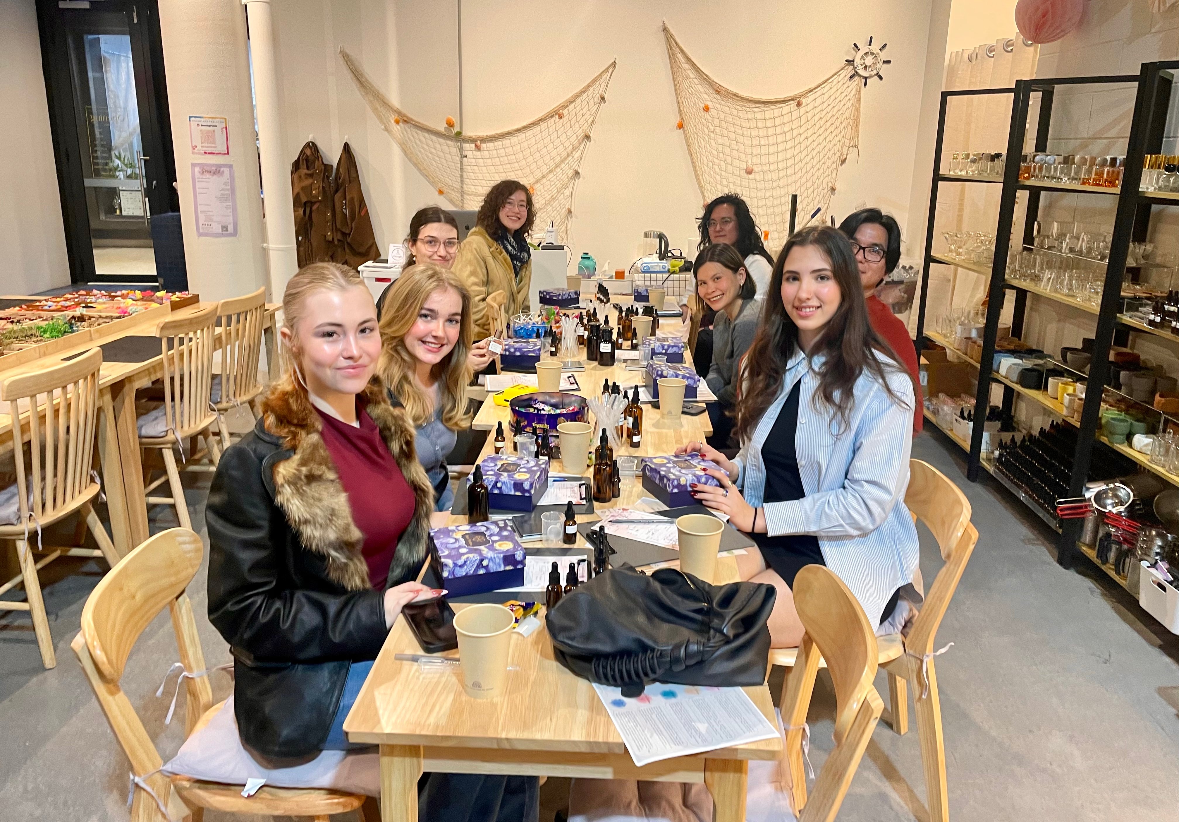 large group at perfume making class