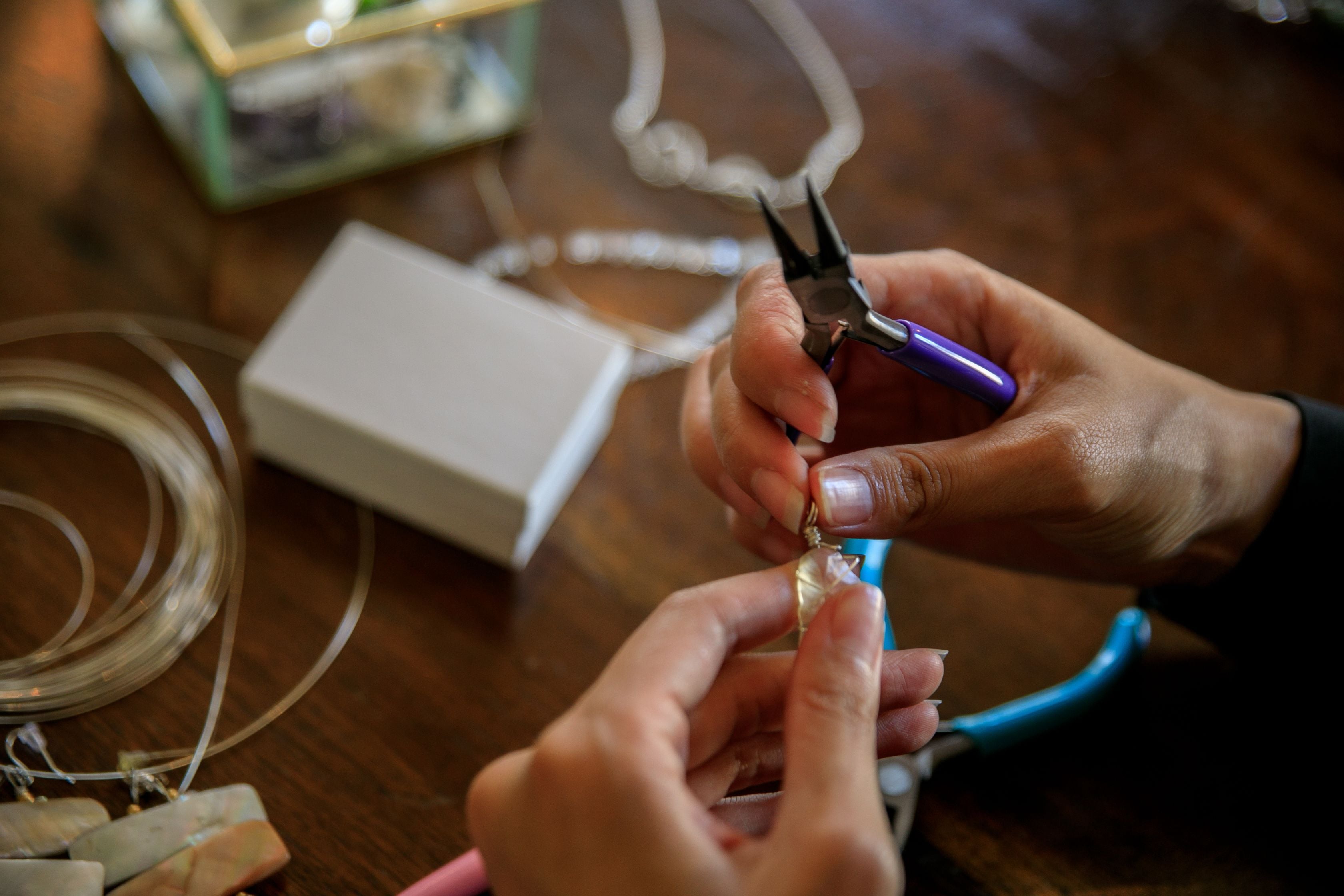 Someone making jewellery