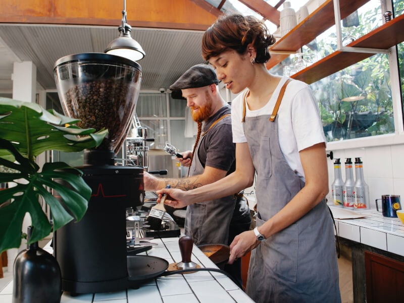 baristas making coffee