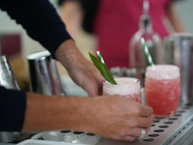 Two pink frothy cocktails