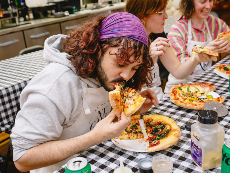 Birthday boy celebrates with handmade pizza