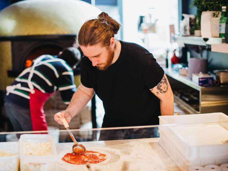Celebrating his birthday at a pizza making class