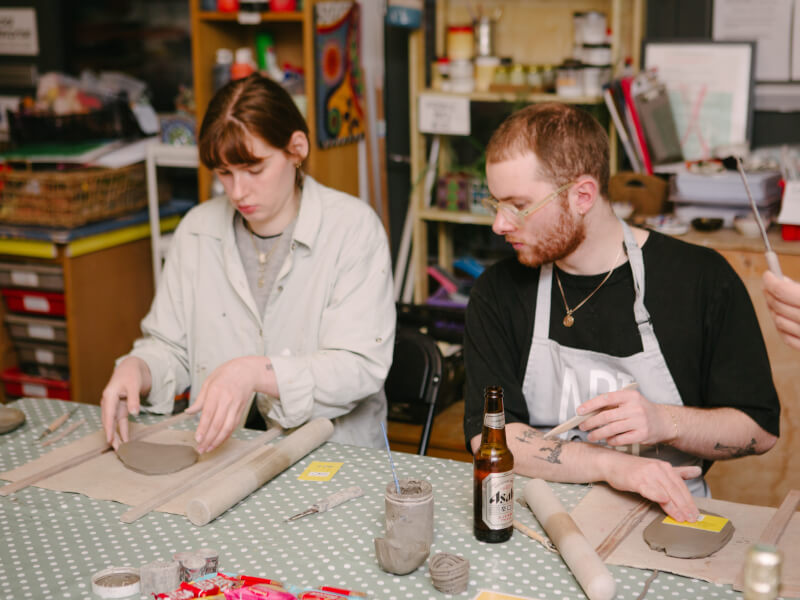 A couple enjoying a pottery class together