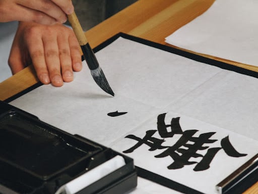 A calligraphy class in progress
