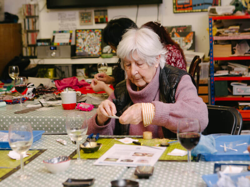 A woman enjoying a kintsugi class