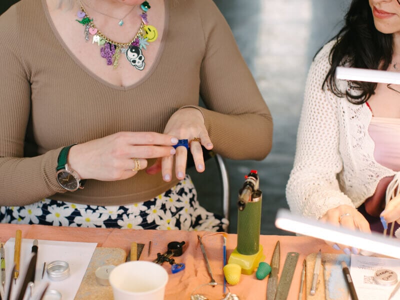 A woman in the process of making a ring