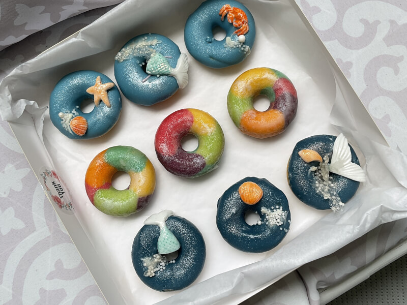 Decorated handmade donuts made in Brisbane cooking class