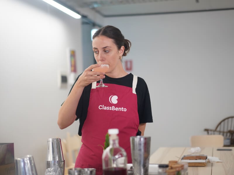 Woman tries her homemade cocktail