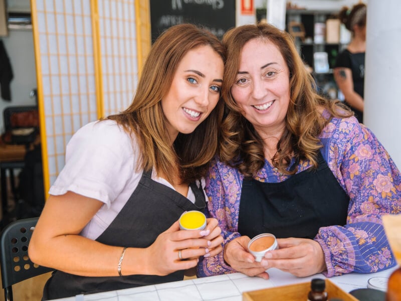 Mother and daughter enjoying a beauty class together