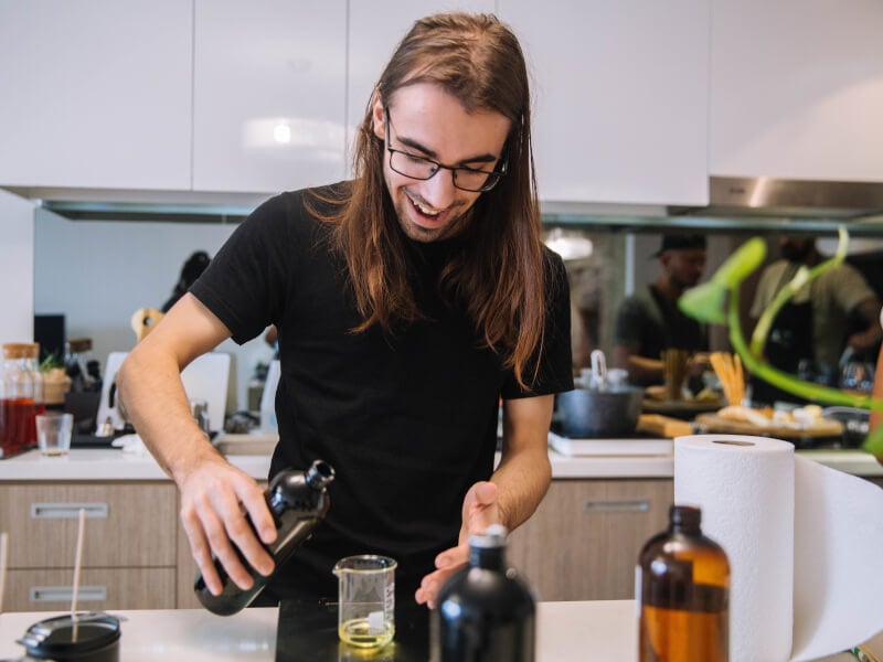 A man at a candle making experience