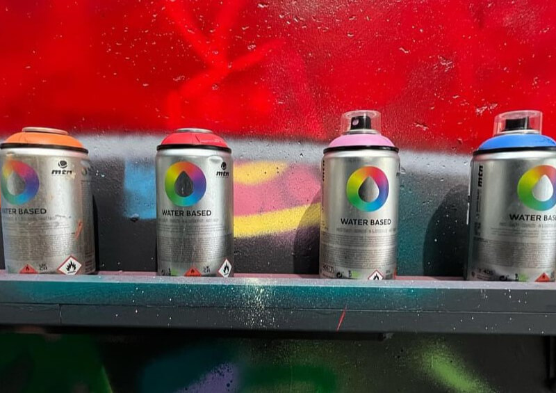 Spray cans lined up