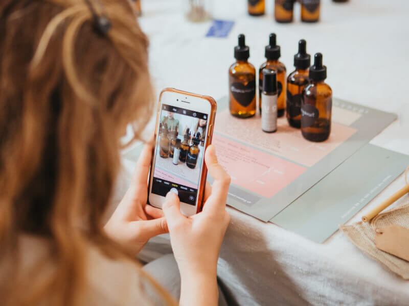 A woman practices still-life photography