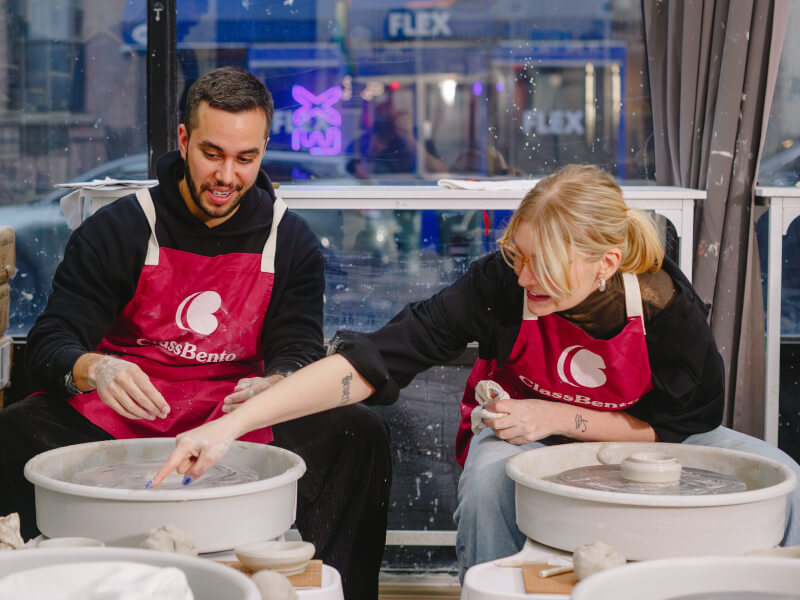 A couple try wheel throwing for his anniversary gift