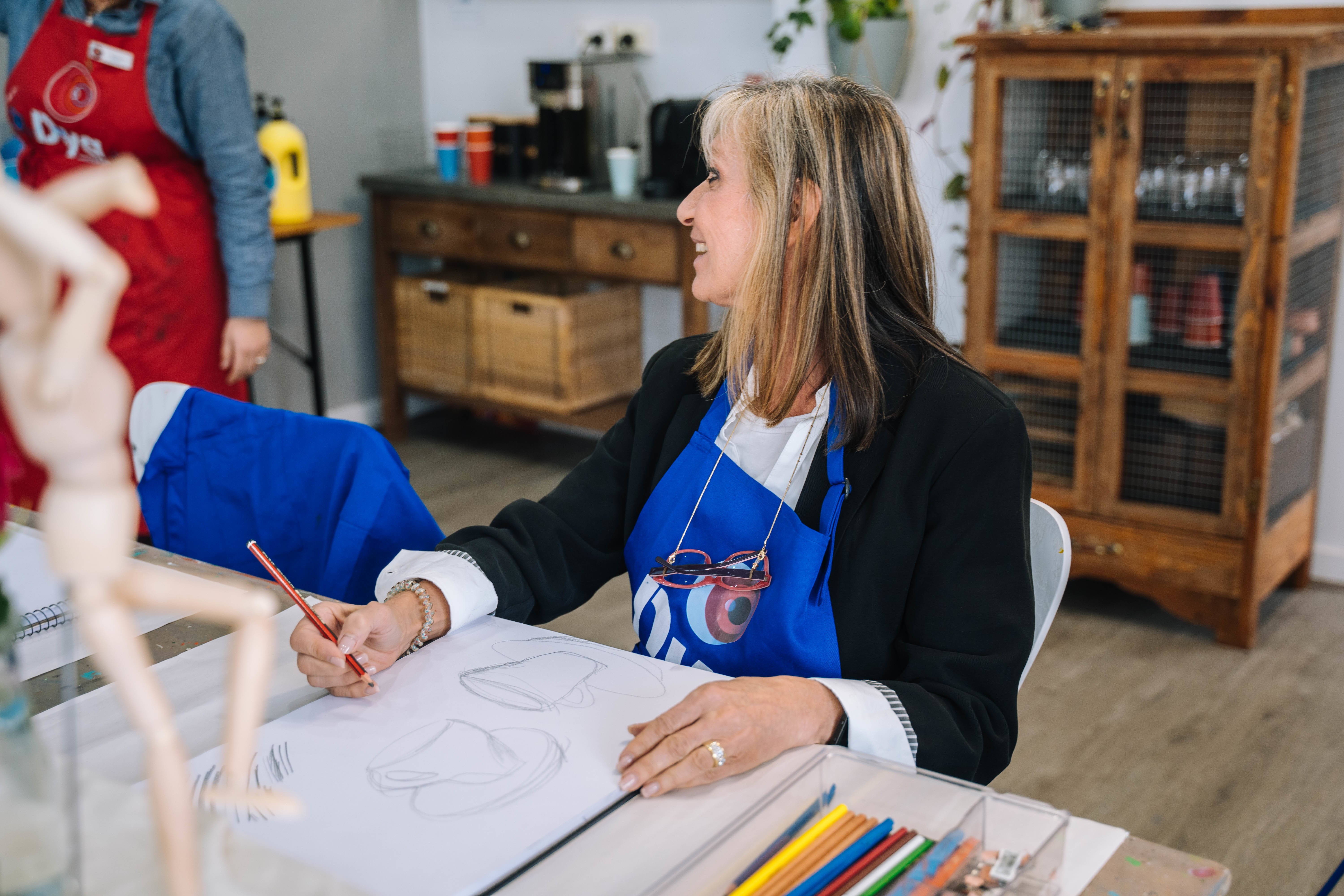 A woman tries learning to draw instead of going on her phone