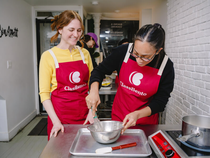 Two women celebrate a 30th birthday with a baking class