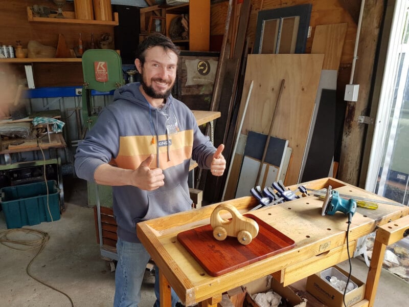 man smiling at woodworking course in Perth