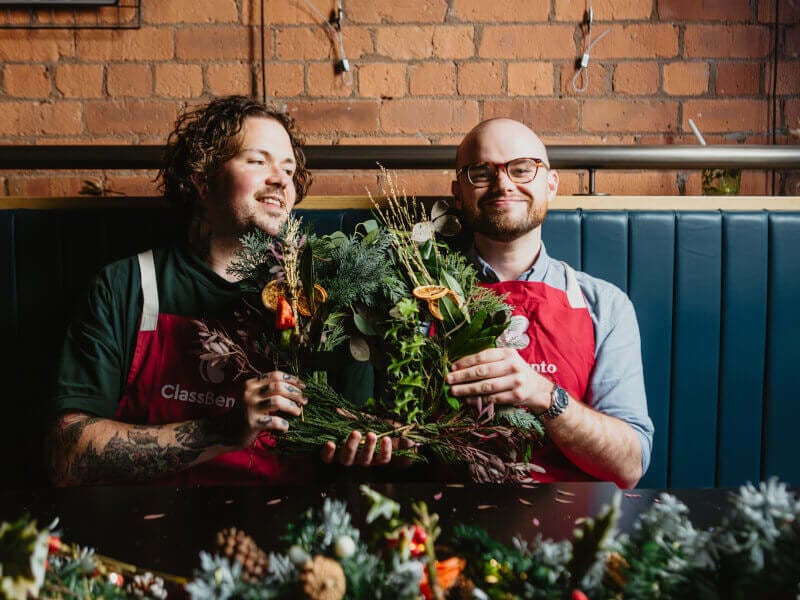Office party with xmas wreath making